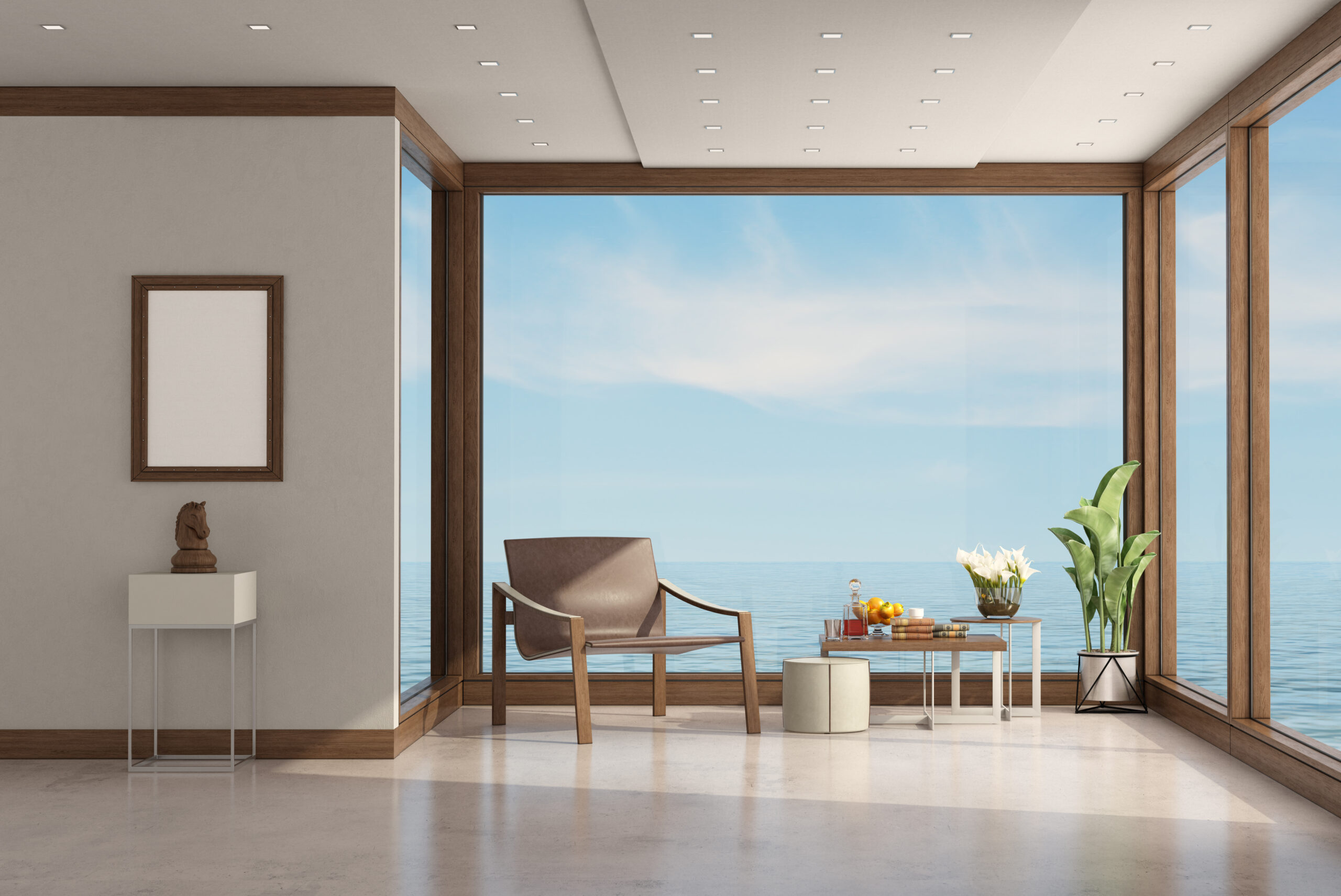 modern living room of a villa by the sea, with leather armchair and coffee tables - 3d rendering